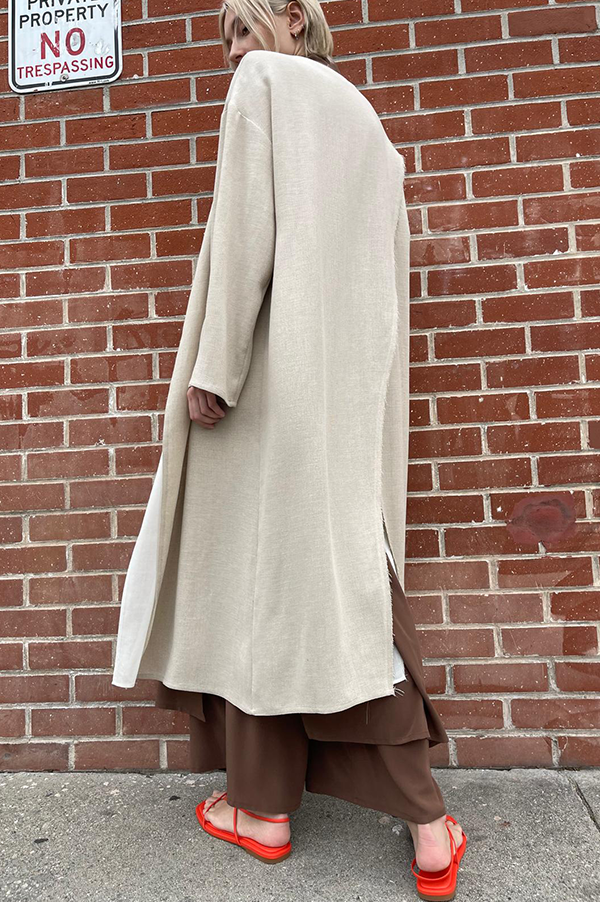 Dusan Crepe Linen Trech Coat. Dusan Linen Long Linen Trench Coat Natural . Dusan Trench Coat. Dusan Natural. Dusan patch pockets on lining layer. Dusan Trench Coat Diagonal slit in back. Dusan raw edges. Dusan Relaxed fit trench coat milk. Dusan Los Angeles. Dusan West Hollywood. Dusan Des Kohan. Dusan Des Kohan exclusive. Dusan fully lined trench. Dusan Open closure Trench Coat. 