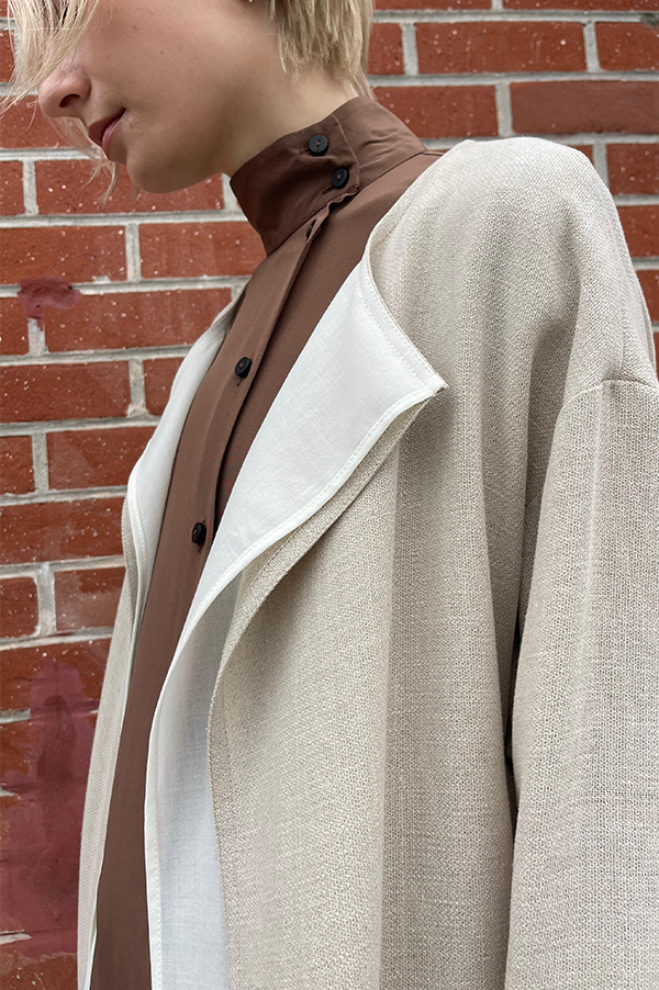 Dusan Crepe Linen Trech Coat. Dusan Linen Long Linen Trench Coat Natural . Dusan Trench Coat. Dusan Natural. Dusan patch pockets on lining layer. Dusan Trench Coat Diagonal slit in back. Dusan raw edges. Dusan Relaxed fit trench coat milk. Dusan Los Angeles. Dusan West Hollywood. Dusan Des Kohan. Dusan Des Kohan exclusive. Dusan fully lined trench. Dusan Open closure Trench Coat. 