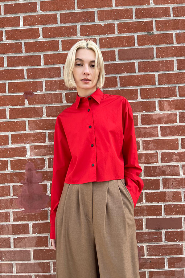 Lightweight Italian cotton shirt vibrant apple red. cropped shirt apple red. singular back box pleat hang loop. Maria McManus Crimson Red Waist-length shirt. McManus Scarlet Red Waist-length shirt. Maria McManus Cropped shirt Apple Red. Maria McManus Biodegradable buttons. Maria McManus Relaxed easy fit Apple Red shirt. Maria McManus Relaxed easy fit Scarlet Red shirt. Cropped button down shirt Apple red. Maria McManus button down shirt Apple Red. Maria McManus button down shirt scarlet. Crimson Red Shirt.