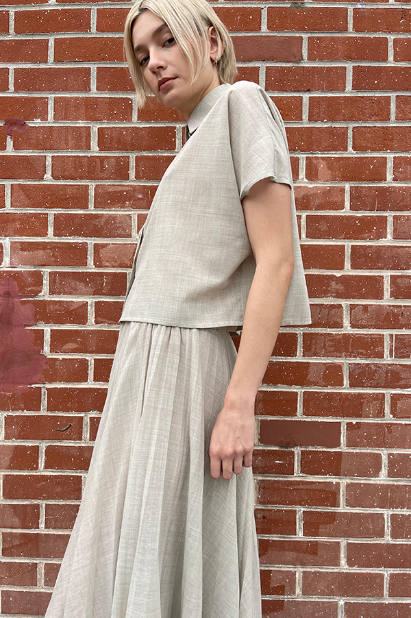 Sand shirt short sleeve. Sand Dusan short sleeve shirt. Dusan. Dusan latte brown.  Cropped Shirt. Virgin Wool Dusan. Cropped virgin wool DUSAN. Dusan small point collar shirt. Dusan Boxy cut. Dusan Short sleeves. Dusan Front button closure Dusan   Sand Dusan. Dusan Des Kohan. Des Kohan Los Angeles. Dusan West Hollywood. Des Kohan exclusive. Exclusive Sand Dusan cropped Voile Shirt. Dusan thin virgin wool. Dusan Garden Party. 