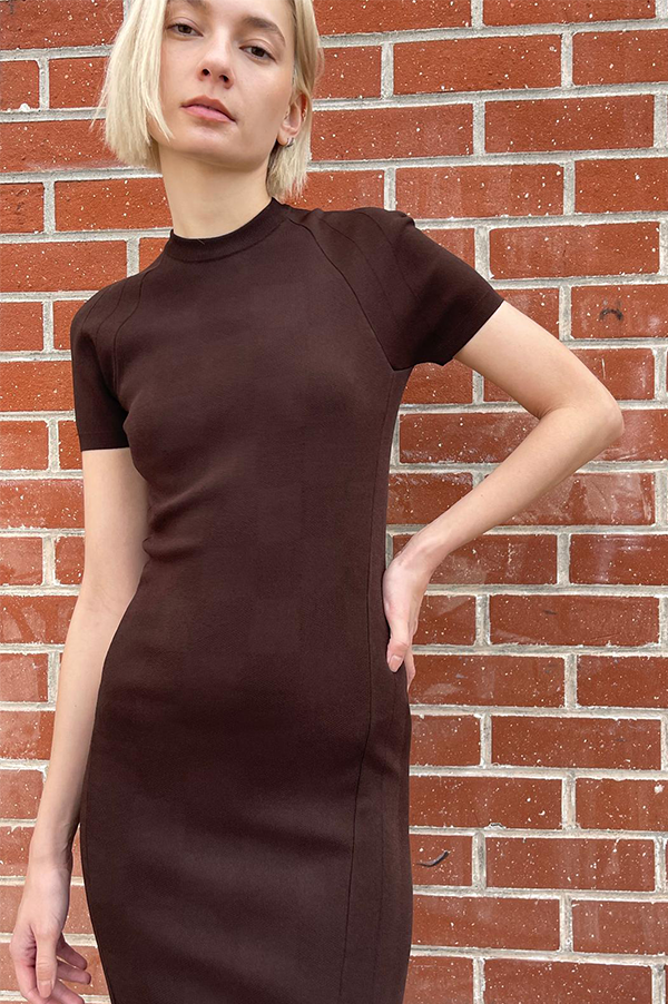 High Sport Sean Dress. Chocolate  Brown. Cocoa. Coffee. Crew Neck. Soft Viscose blend knit. Classic Short Sleeves dress. Paneled Construction. Generous fit. Waist length. Rib trim neck. Rib trim finished armholes.  Rib trim finished Neckline. Overlock finished hem. Chic. Business. Versatile. Stylish. Rich. Excellent fit. Day to Night. Exceptional quality. Timeless. Made in Italy. Designed in Los Angeles. Premier fashion. Curated Des Kohan Boutique. Fairfax.  High- end. Fashion forward. 