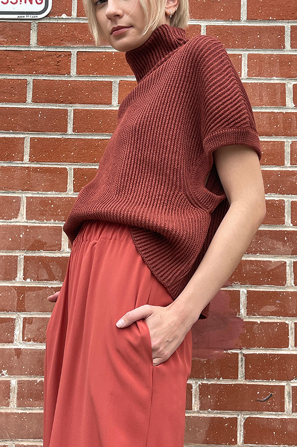 Dusan Ribbed knit sleeveless drop shoulder relaxed fit. Dusan Sleeveless T neck Sweater. Dusan Sweater Terracotta. Dusan Linen, cashmere, silk blend sweater. Dusan Los Angeles. Dusan West Hollywood. Dusan Des Kohan. Dusan Des Kohan exclusive. Dusan Rust. Dusan Cranberry. Dusan Cashmere. Dusan linen silk, cashmere blend.